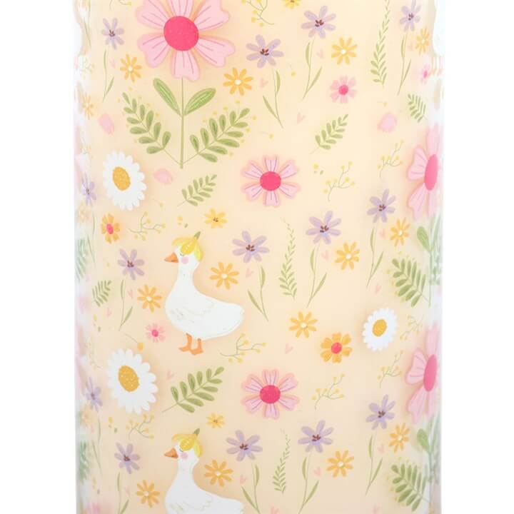 Daisy & Duck Print Vanilla Tube Candle in decorative tall glass design with floral patterns and springtime vibes.