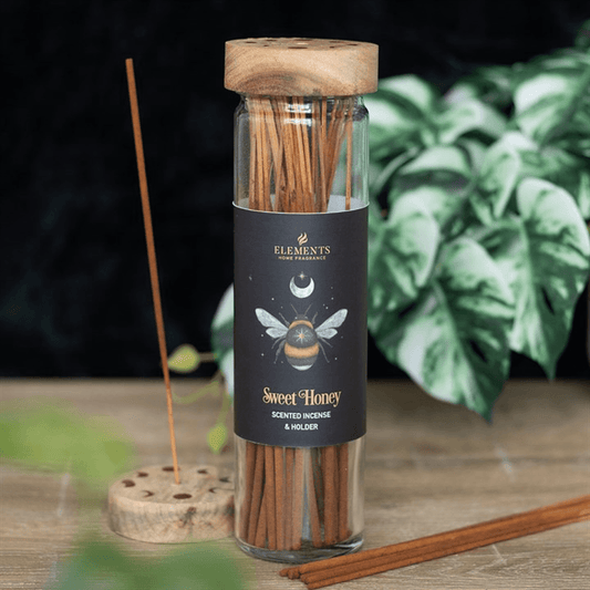 Honey Incense Sticks in a clear glass jar with a wooden lid, featuring a label that says Sweet Honey.