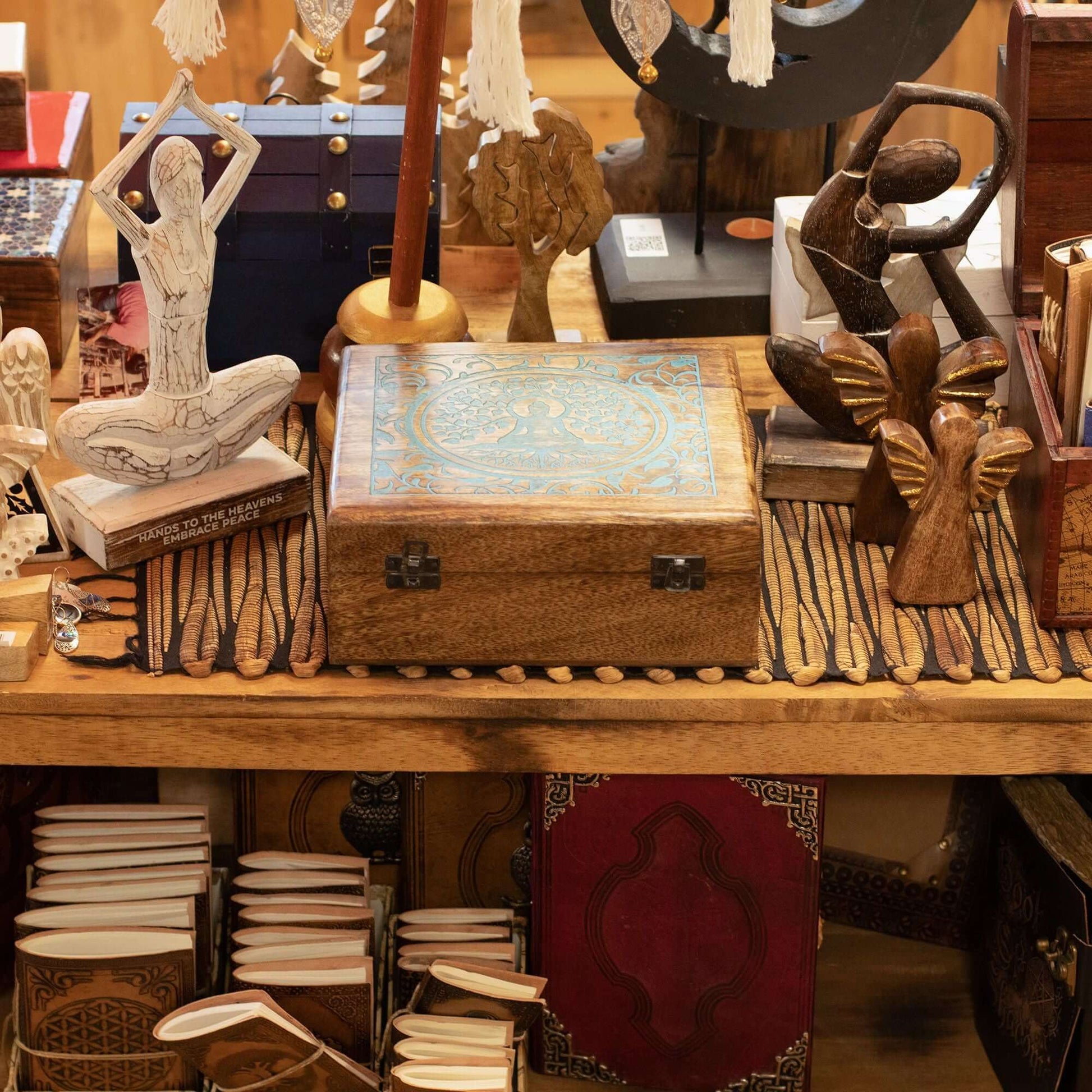 Extra Large Mango Box with intricate design showcased among various artisanal decorations and wooden sculptures.