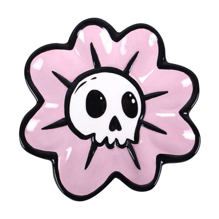 Cute, creepy, and practical—the Flower Skull Trinket Dish is the perfect blend of sweet and spooky. Featuring a delicate flower shape with a bold skull centre, this unique piece adds personality and attitude to any space. Ideal for keeping your everyday e