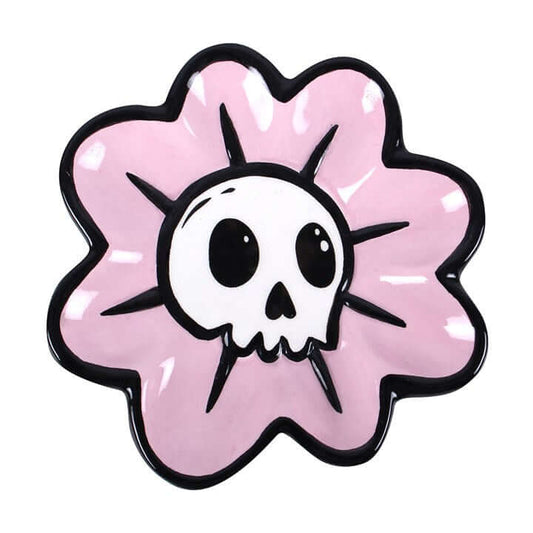Cute, creepy, and practical—the Flower Skull Trinket Dish is the perfect blend of sweet and spooky. Featuring a delicate flower shape with a bold skull centre, this unique piece adds personality and attitude to any space. Ideal for keeping your everyday e