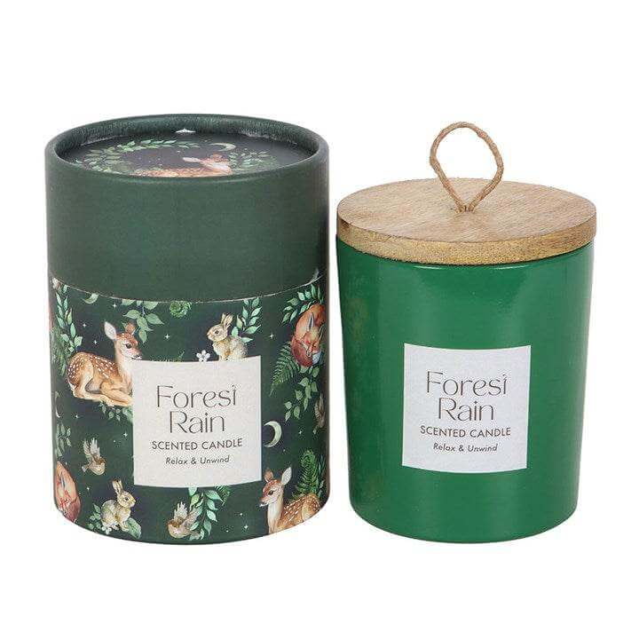 Woodland Scented Candle in a decorative green container with a wooden lid, featuring forest-themed design.
