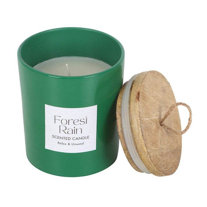 Forest Rain Woodland Scented Candle in a green container with wooden lid for a refreshing woodland aroma.