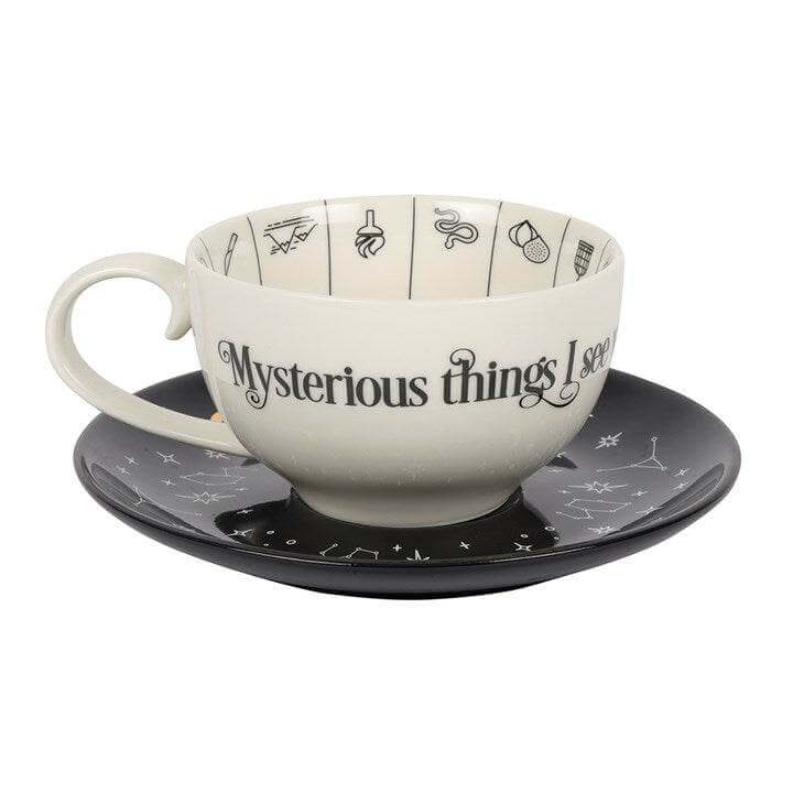 Fortune Telling Ceramic Teacup with Saucer featuring mystical designs for tea leaf reading and insight into the future.