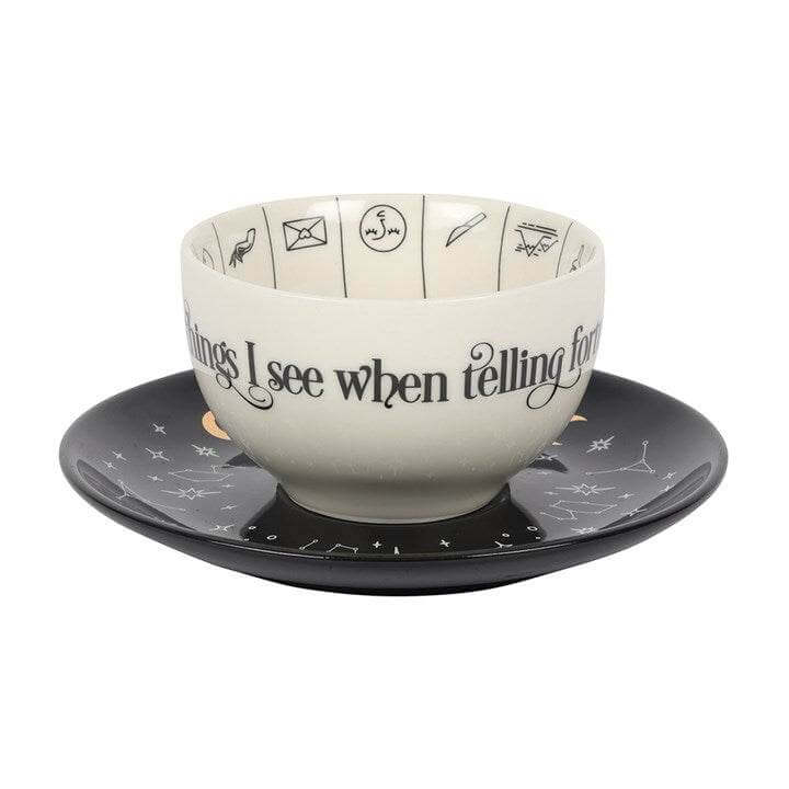 Fortune Telling Ceramic Teacup with Saucer showing symbols for tea leaf reading and mystic designs.