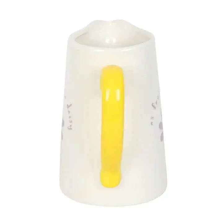Fresh as a Daisy Ceramic Flower Jug with yellow handle and floral design for spring décor and gifts.