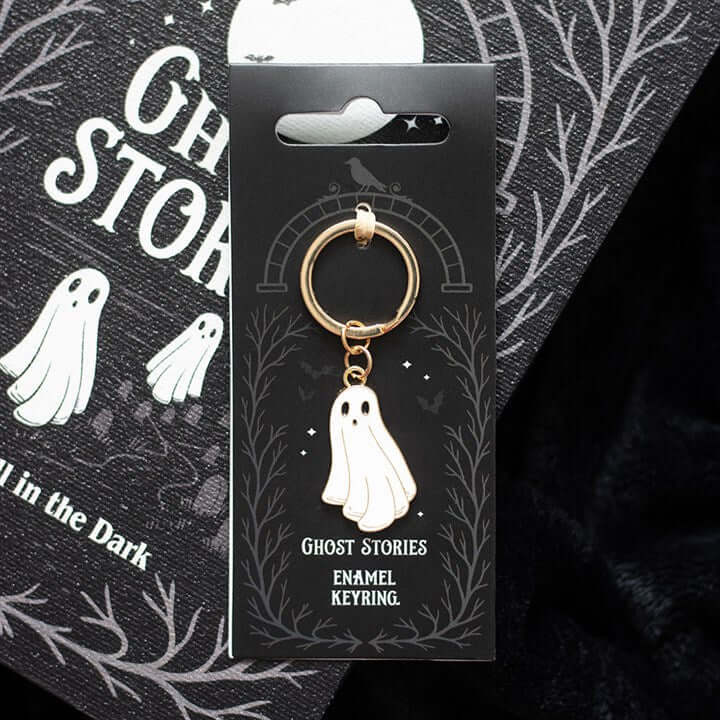 Add a charmingly spooky touch to your everyday essentials with this Ghost Stories Ghost Keyring. Featuring a sweet floating spirit inspired by classic ghost tales, this enamel keyring is the perfect blend of cute and creepy. Ideal for clipping onto keys,