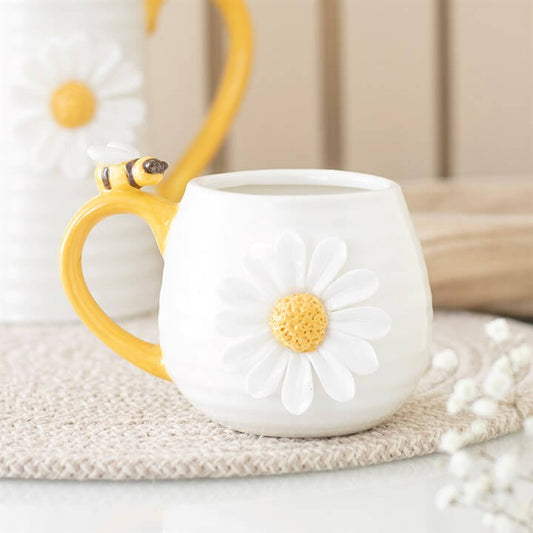Honey Bee Mug featuring raised daisy design and a honey bee detail, perfect for springtime enjoyment.