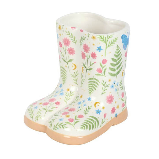 Luna Bloom floral ceramic welly boot plant pot, perfect for small plants and adding color to indoor spaces.