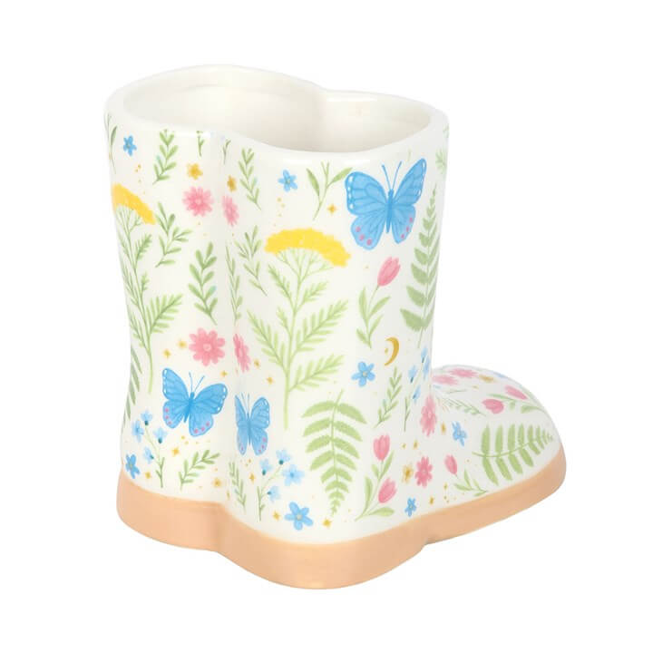 Luna Bloom floral print welly boot plant pot, perfect for small plants and adding color to indoor spaces.