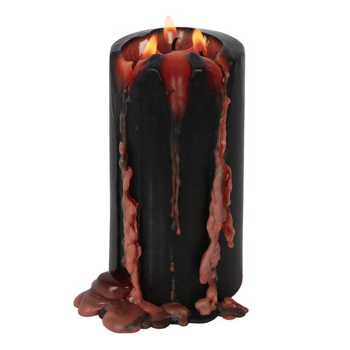 Large Vampire Blood Pillar Candle with bleeding wax effect and flickering flame for eerie ambiance.