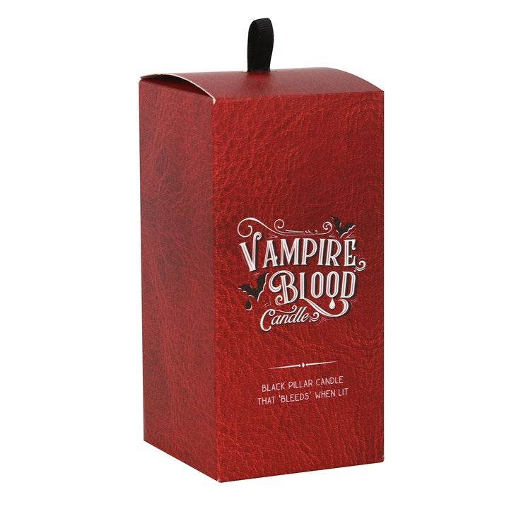 Packaging for Large Vampire Blood Pillar Candle featuring eye-catching design and blood-like appearance in the UK.