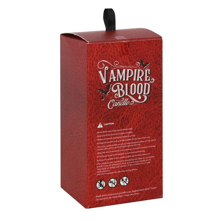 Vampire Blood Candle packaging showcasing red box design and caution label, featuring the text 'Vampire Blood Candle'.