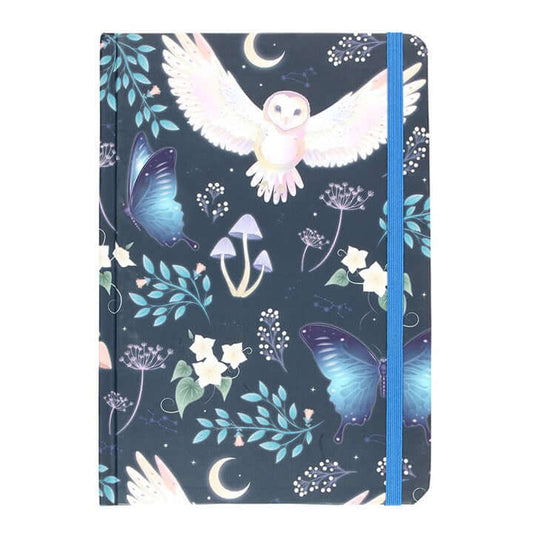 Notebook with owl, butterfly, and floral design on a dark blue background