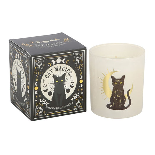 Black Fig Candle next to its packaging, featuring a black cat design and celestial motifs.