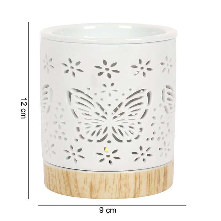 Matte Ceramic Butterfly Oil Burner featuring delicate butterfly cut-out designs and a smooth matte finish.