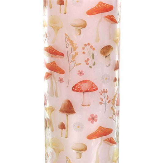 Mushroom print design on a tube candle, featuring various whimsical mushrooms and flowers, perfect for home decor.