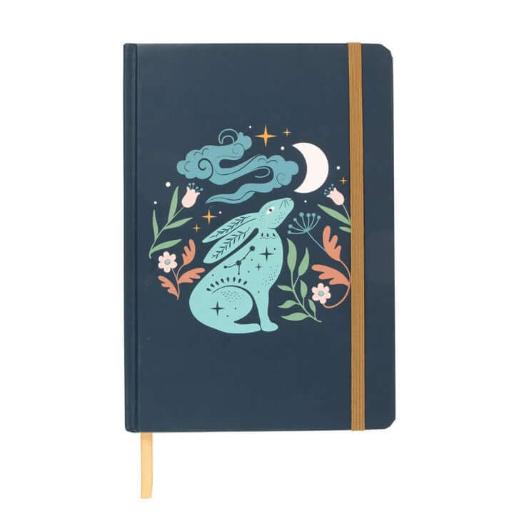 Notebook with a blue rabbit illustration on a dark blue background