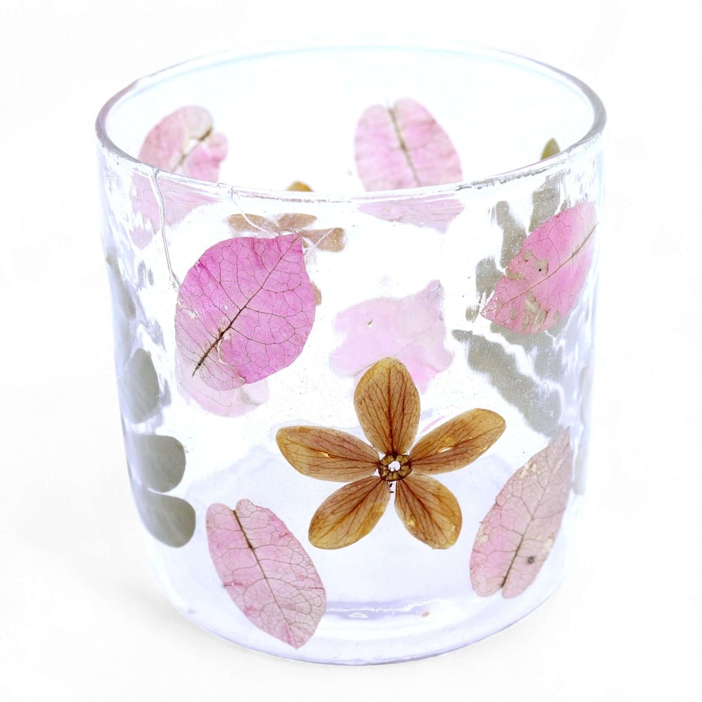 Natural Floral Glass Candle Holder showcasing pressed leaves and blossoms in pink within recycled glass.