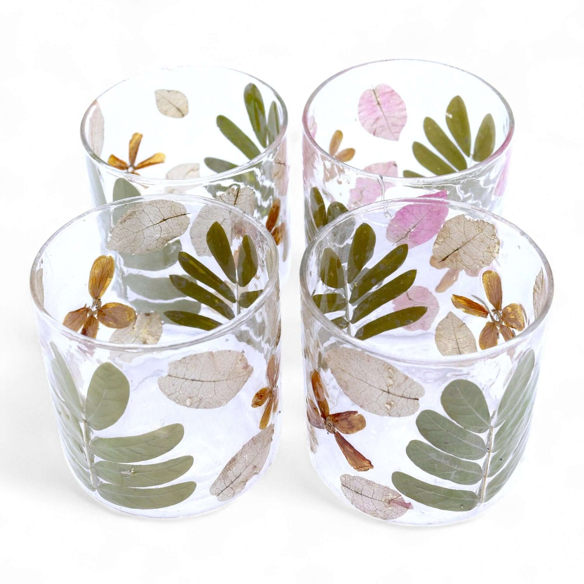 Natural Floral Glass Candle Holder featuring real leaves and blossoms, perfect for tea lights or small candles.