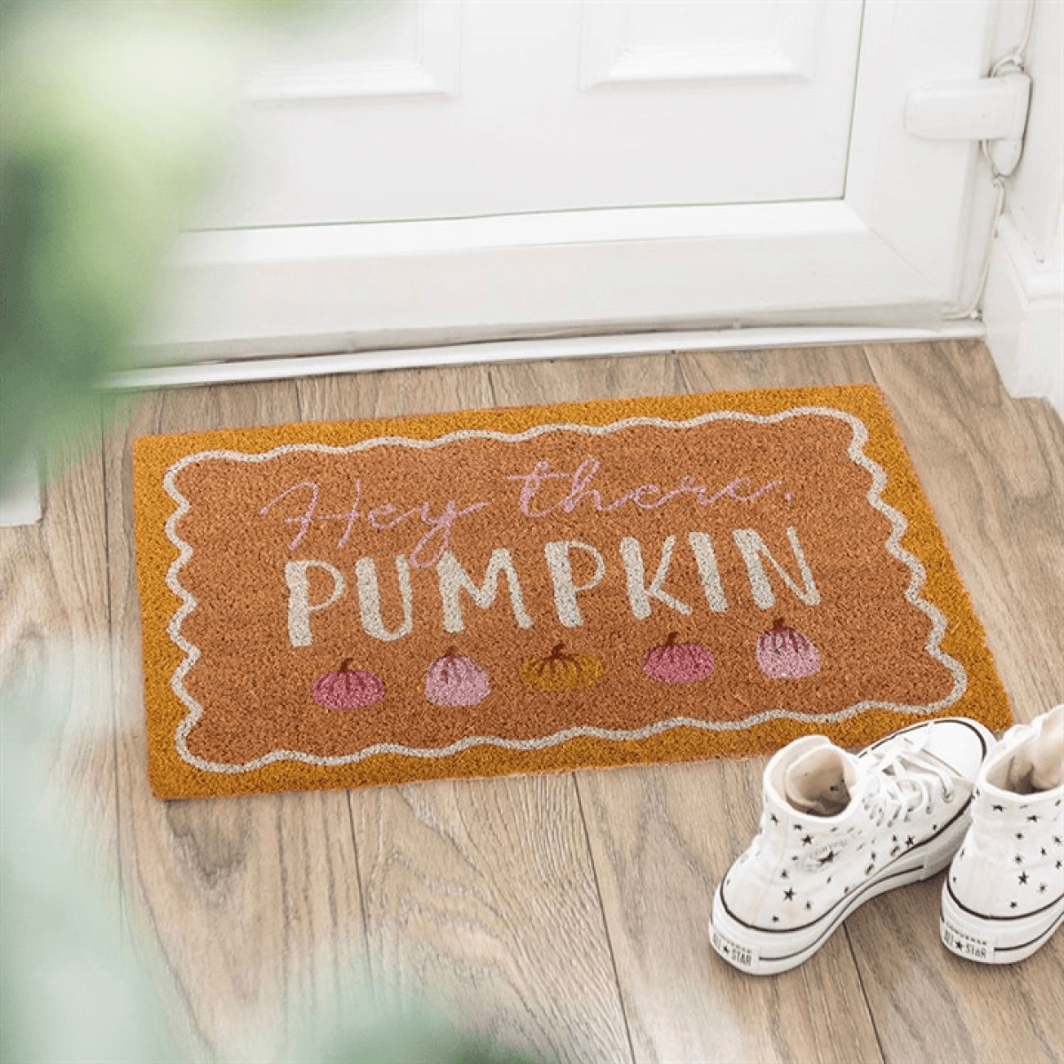Natural Hey There Pumpkin Doormat with cozy pumpkin designs, welcoming guests at an autumn-themed entryway.