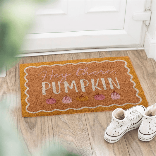 Natural Hey There Pumpkin Doormat with cozy pumpkin designs, welcoming guests at an autumn-themed entryway.