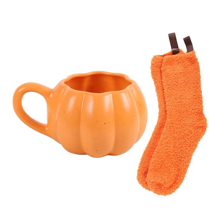 Pumpkin Shaped Mug and Socks Set featuring a sculpted pumpkin mug and fluffy orange socks for autumn cozy vibes.