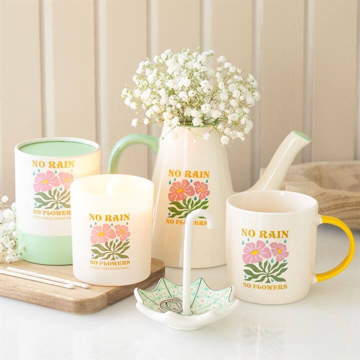 No Rain No Flowers Mug collection with colorful design and cheerful yellow handle, perfect for uplifting moments.