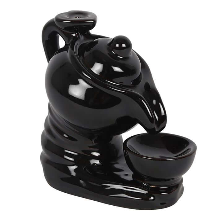 Black ceramic incense burner on a white background