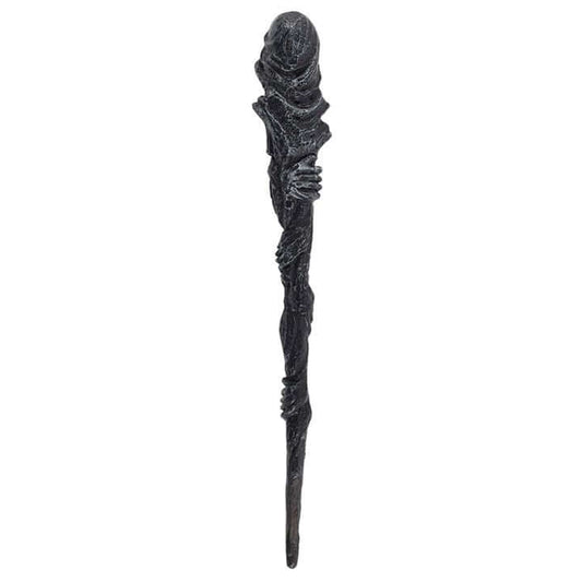 Decorative staff with intricate design on a white background