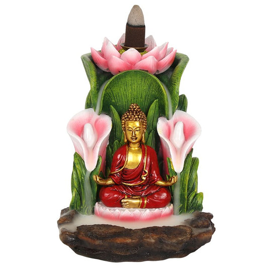 Decorative figurine of a Buddha statue with pink flowers and green leaves on a white background