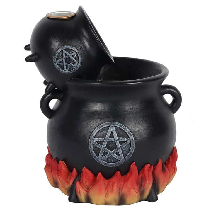 Black cauldron with pentacle design and flames on a white background