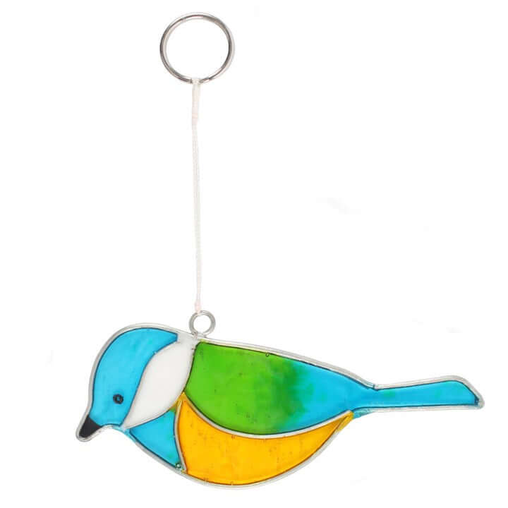 Colorful bird-shaped ornament hanging on a white background