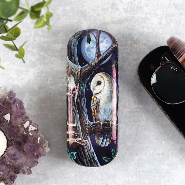 Phone case with owl design on a textured surface