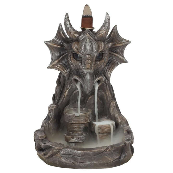 Dragon-shaped incense burner with a white background