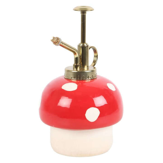 Mushroom-shaped red and white bottle with gold pump on a white background