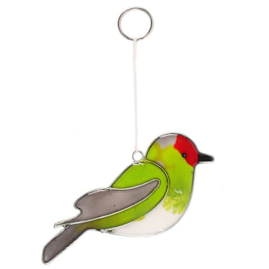 Stained glass bird ornament with a red head on a white background