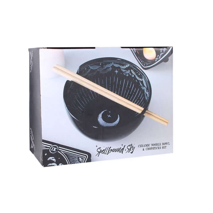 Spellbound Sky Noodle Bowl and Chopsticks Set packaging featuring black ceramic bowl and wooden chopsticks.