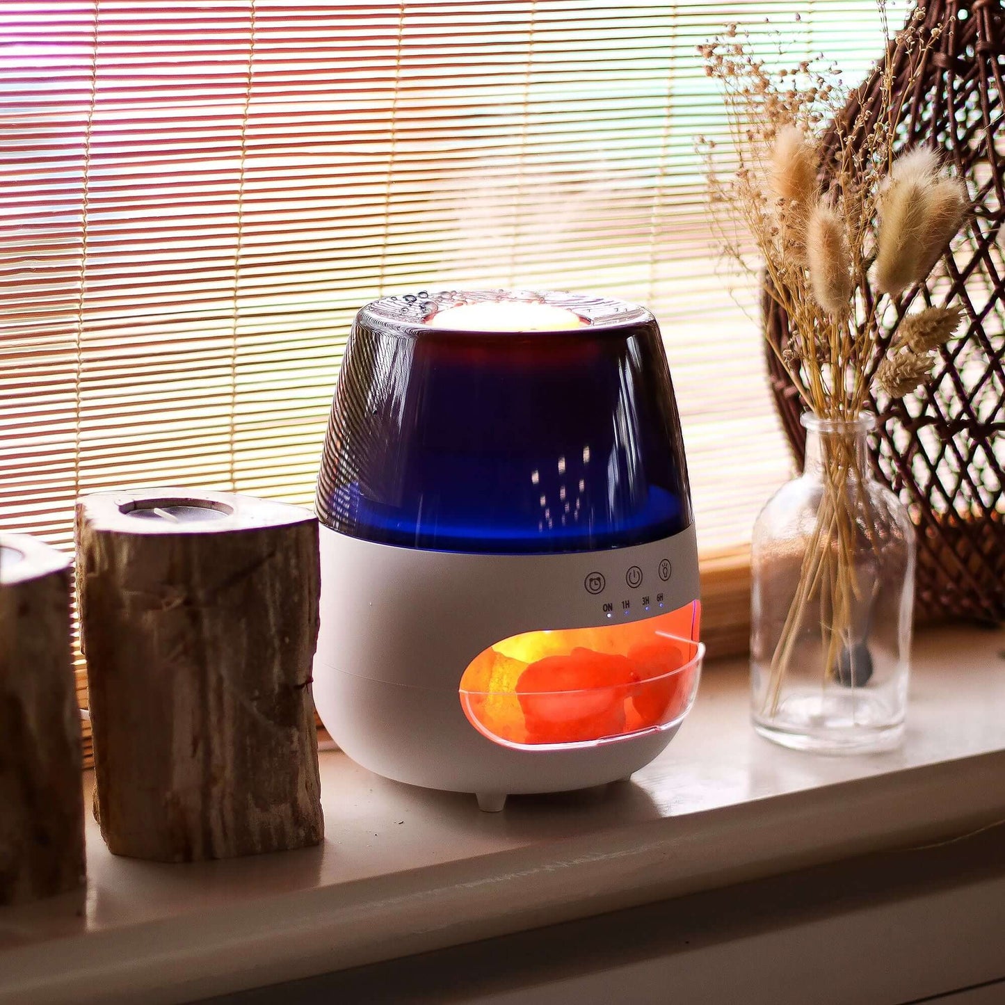 Salt Stone Flame Effect Aroma Diffuser with colour-changing light on a windowsill