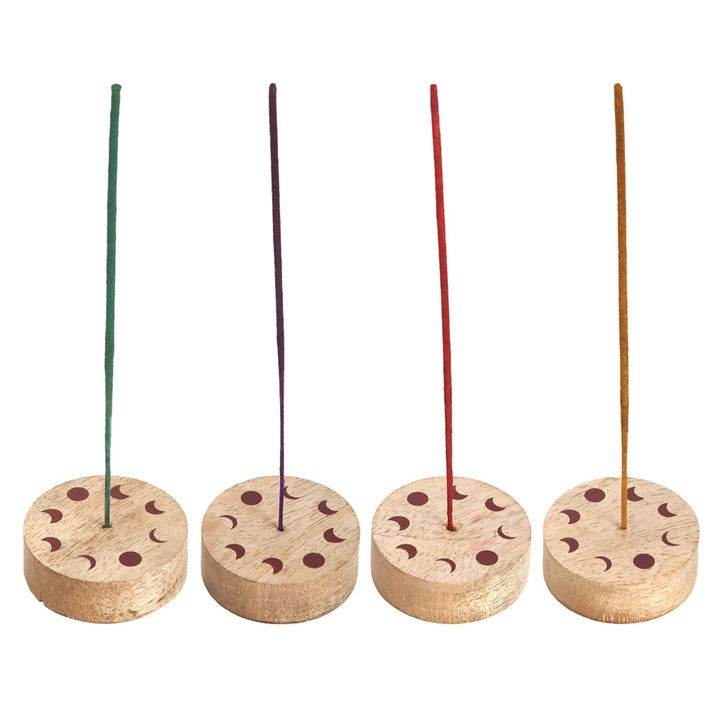 Set of 4 incense holders with colorful sticks, ideal for Forest Incense Sticks and enhancing fragrance experiences.