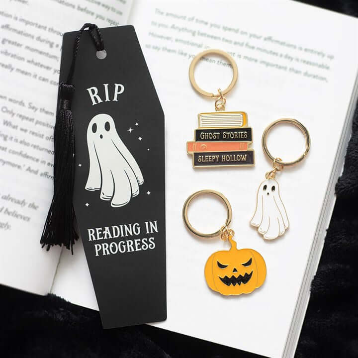 The Legend of Sleepy Hollow Pumpkin Keyring alongside a ghost-themed bookmark and other spooky keyrings.
