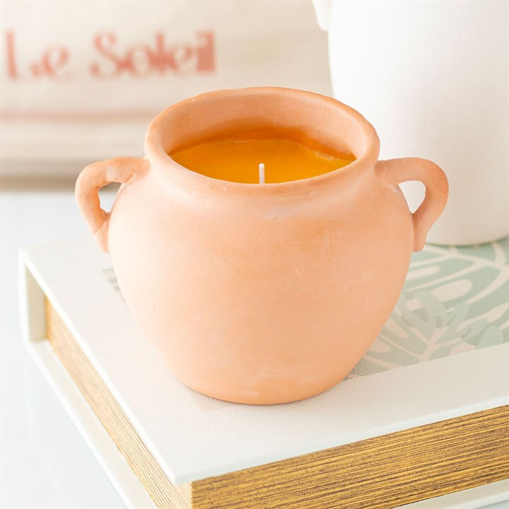 Terracotta Urn Candle with natural citronella for outdoor use, ideal for keeping insects away while enhancing ambiance.