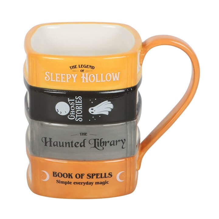 The Haunted Library Book Stack Mug featuring spooky book designs, perfect for cozy reading sessions.