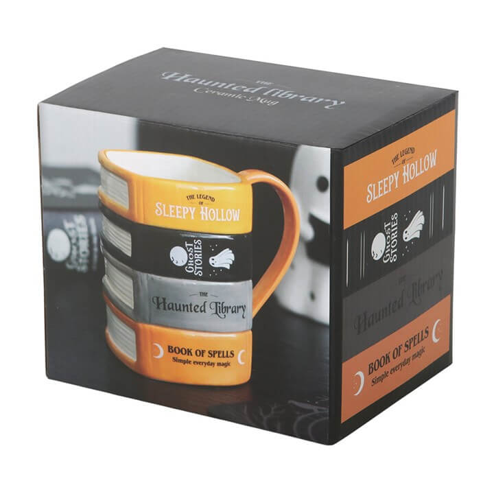 The Haunted Library Book Stack Mug packaging featuring a stack of spooky books design and text 'Sleepy Hollow' and 'Book of Spells'.