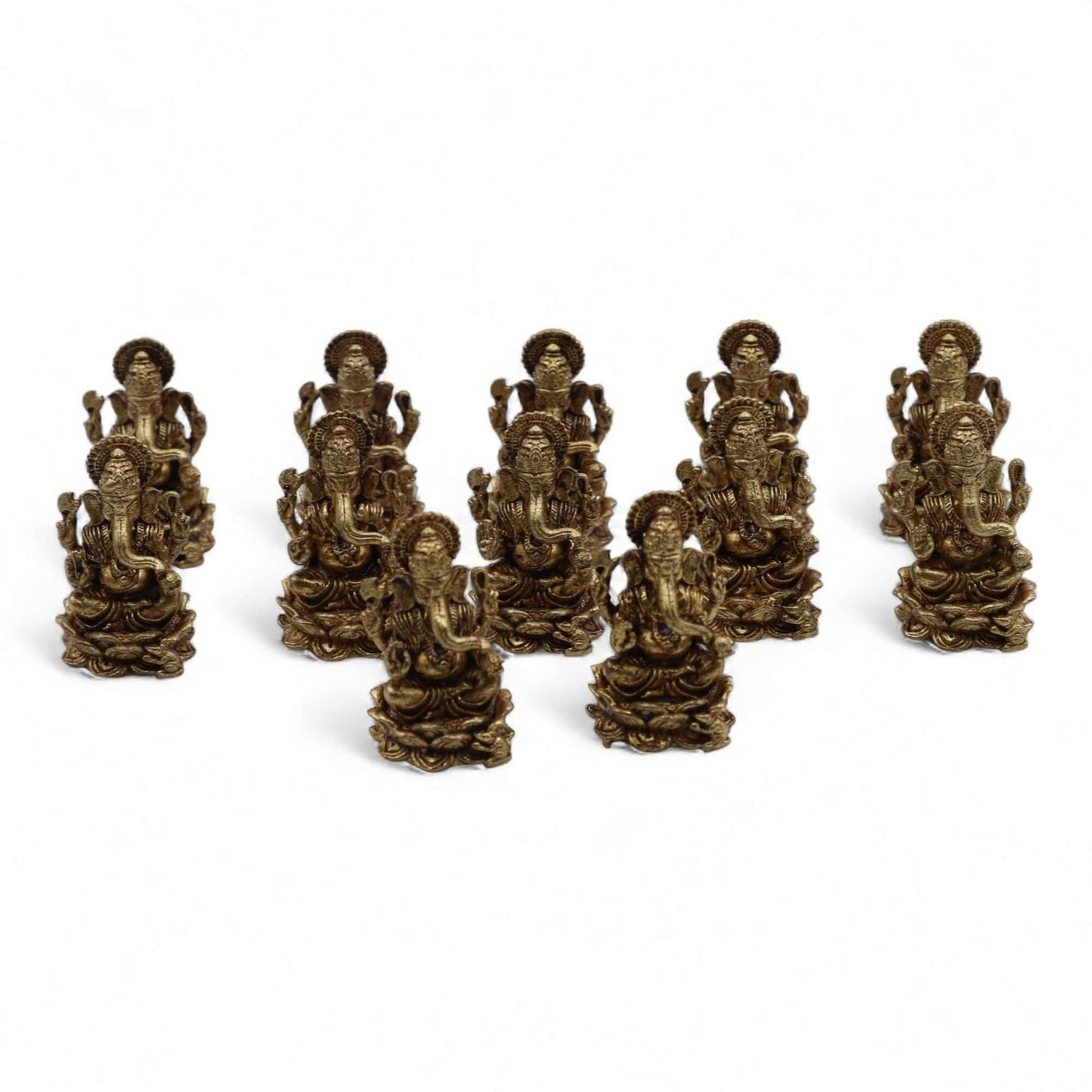 Brass miniature Ganesha Gods figurines arranged in a circle, showcasing intricate craftsmanship.
