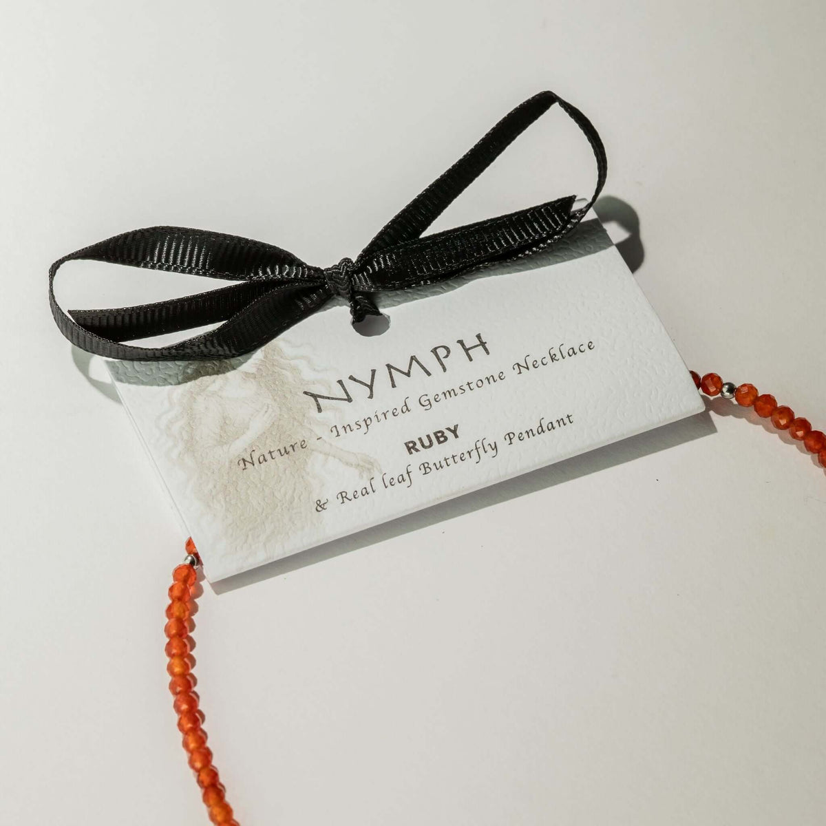 Nymph Ruby Gemstone Necklace with Real Leaf Butterfly Pendant