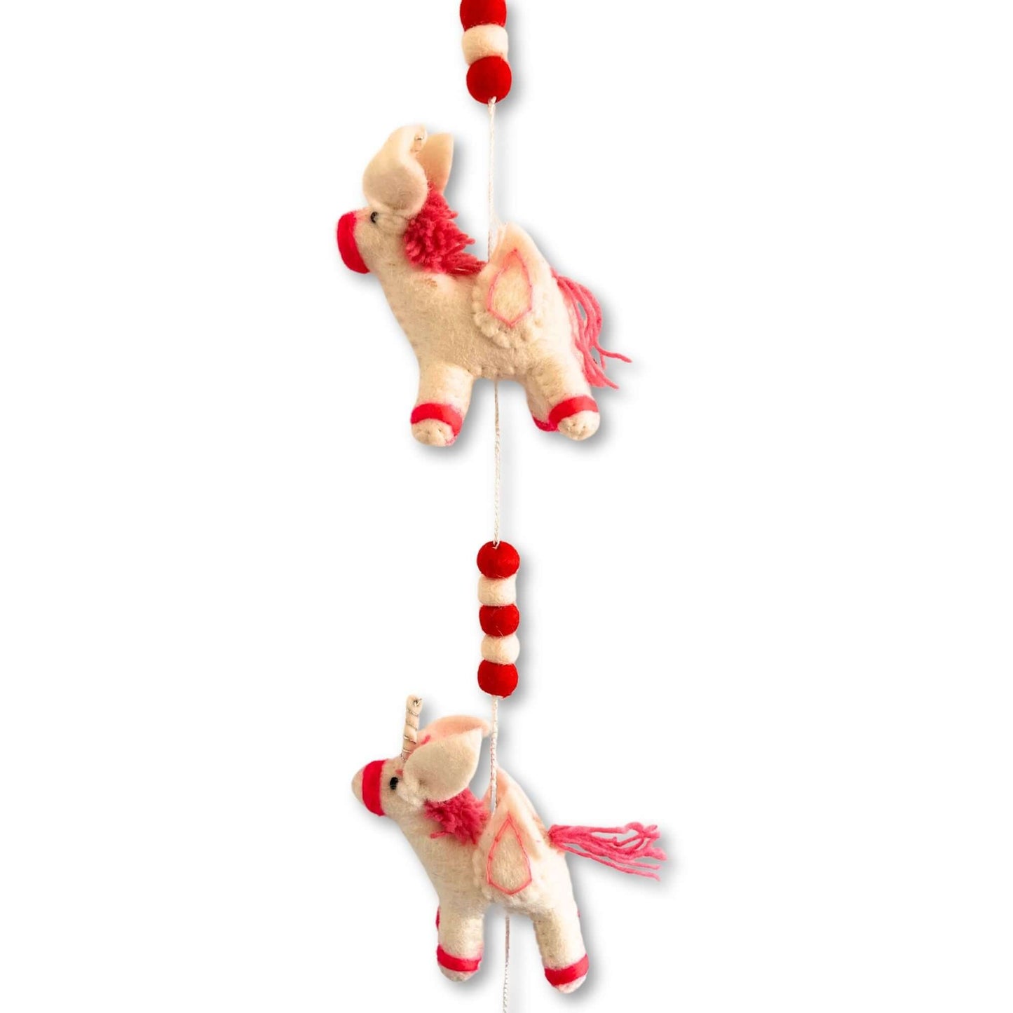 Felt Wall Hanging Unicorns featuring soft, colorful unicorns and beads, perfect for decorating a child's room.