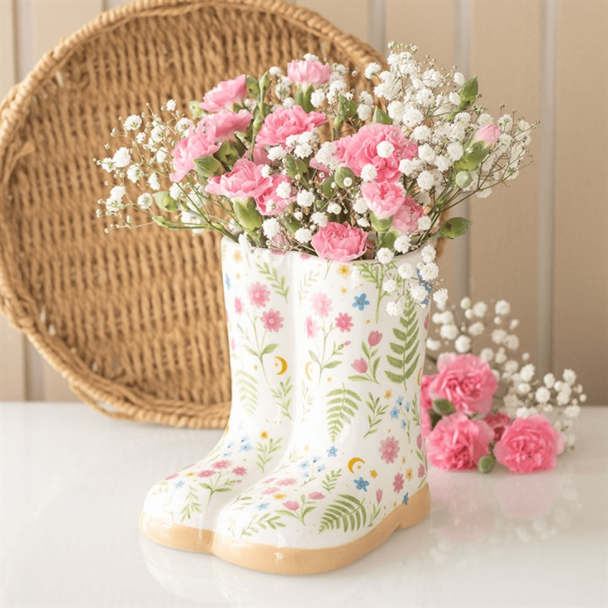 Luna Bloom floral print welly boot plant pot with pink flowers for decorative indoor gardening.