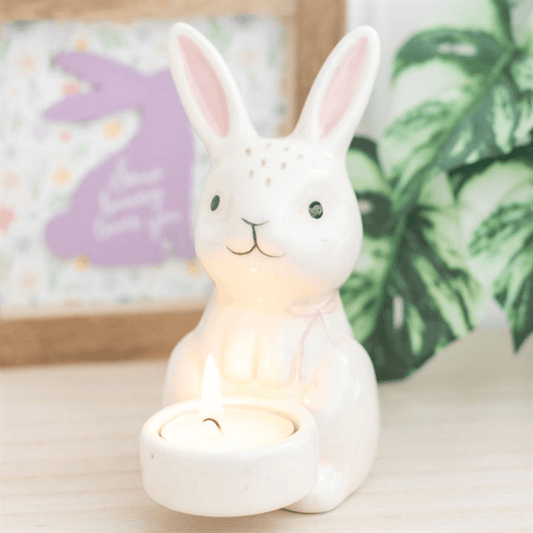 Cute rabbit-shaped night light on a surface with a blurred background