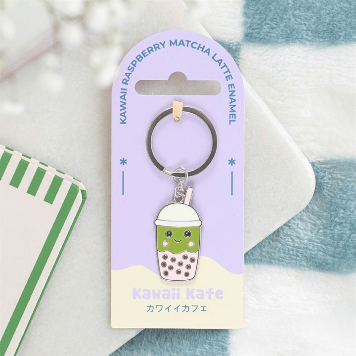 Kawaii Bubble Tea Keyring featuring a matcha latte character with colorful pearls, ideal for accessorizing bags.